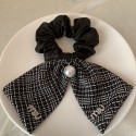 ハイブランドMiuMiuリボン シュシュ ミュウミュウ リボンゴム 黒 髪飾り シュシュ 大人 パール エレガント ヘアアクセ リボン 蝶々結び 黒 生地 少女 髪飾り